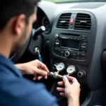 Technician Checking Car AC Refrigerant