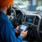 Ford Technician Using Diagnostic Tool in Sri Muktsar Sahib