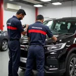 Honda Certified Technicians working in a Dwarka Service Center