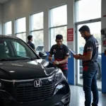 Honda Certified Technicians Working on a Car in Rajajinagar