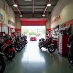 Interior of a well-equipped Honda repair shop in Raipur