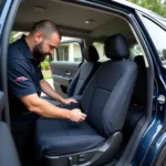 Professional Installing Car Seat Cover at Home