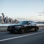 Seattle skyline with a luxury car in the foreground