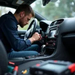 Sony car audio system being repaired by a technician