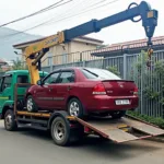 Affordable Car Crane Service in Yangon Transporting a Car