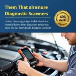 Mechanic Using a Diagnostic Scanner