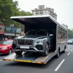 Enclosed Car Carrier Transporting Luxury Car in Gurgaon