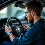 Technician Using Diagnostic Tool on a Car