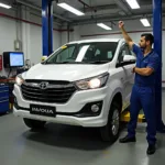 Innova Crysta undergoing regular service in a Delhi workshop