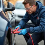 Mobile Mechanic Jump Starting a Car