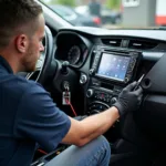 Technician Repairing Sony Car Stereo